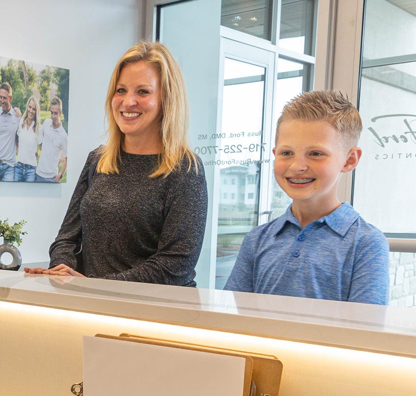 guests at the front desk of Ford Orthodontics