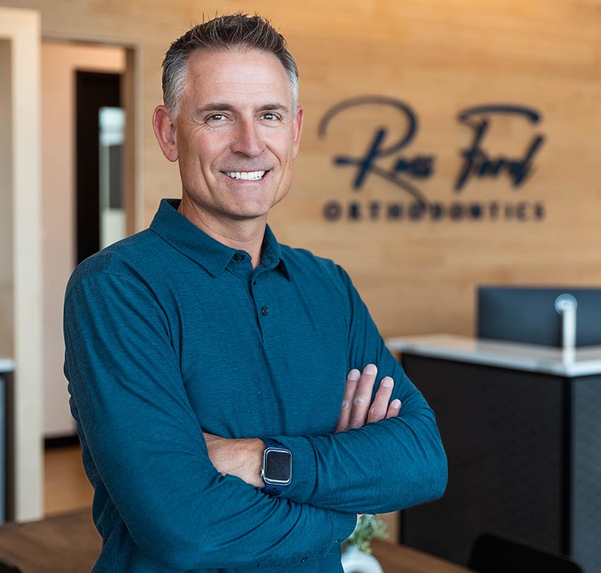 Dr. Russ Ford poses inside his dental office in Colorado Springs, CO